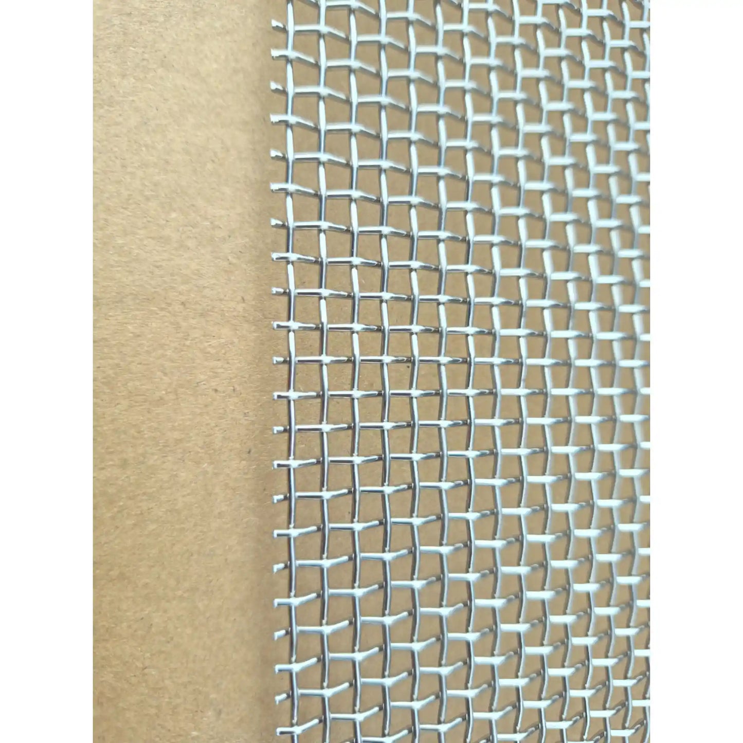 Close-up of stainless steel mesh weave for hive ventilation and beetle control