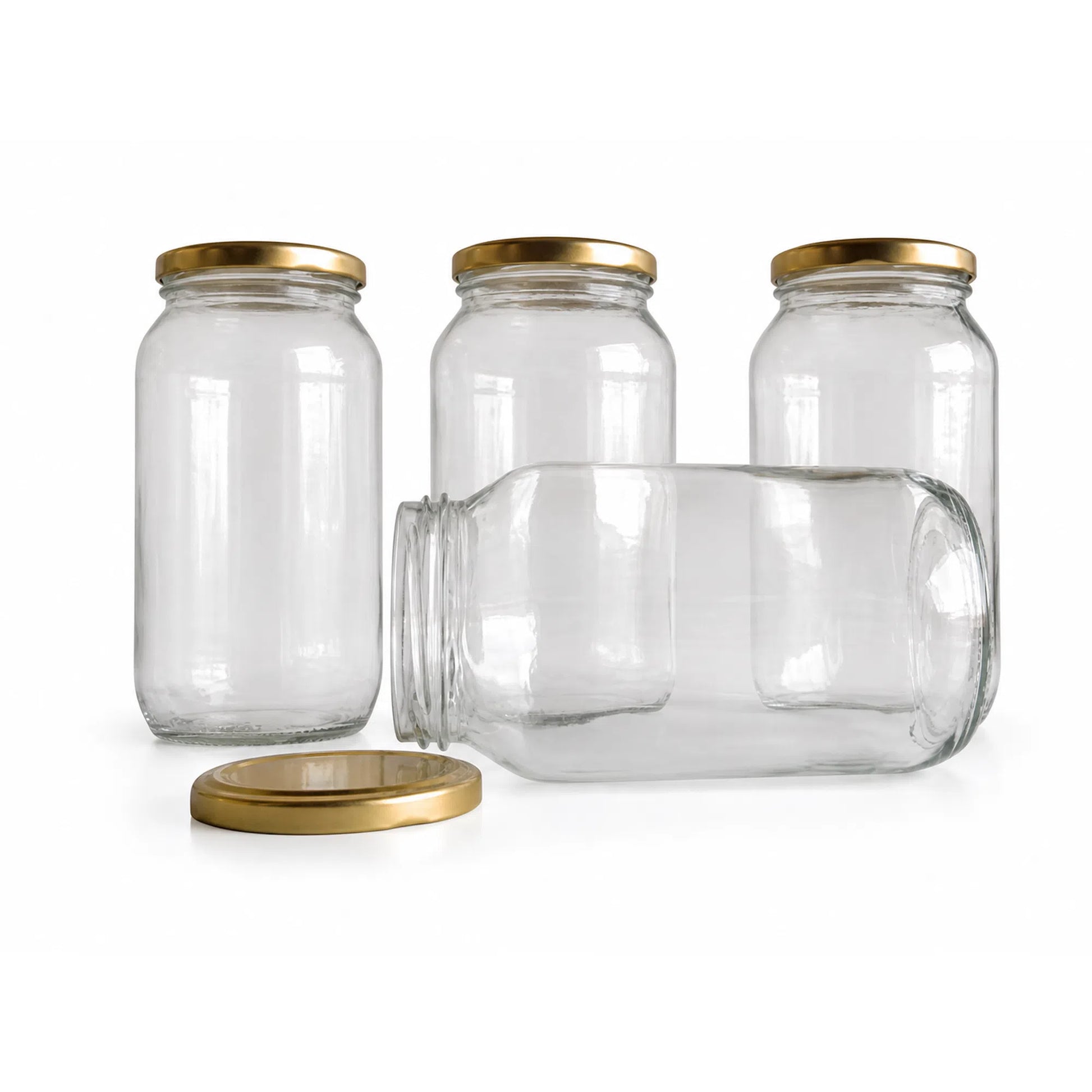Clear 250 ml round glass jars with gold lids for honey storage