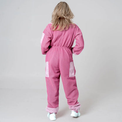 Back view of woman wearing 3 layer mesh pink beekeeping suit