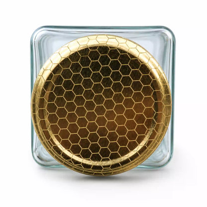 honey Containers with Honeycomb Pattern  close up view