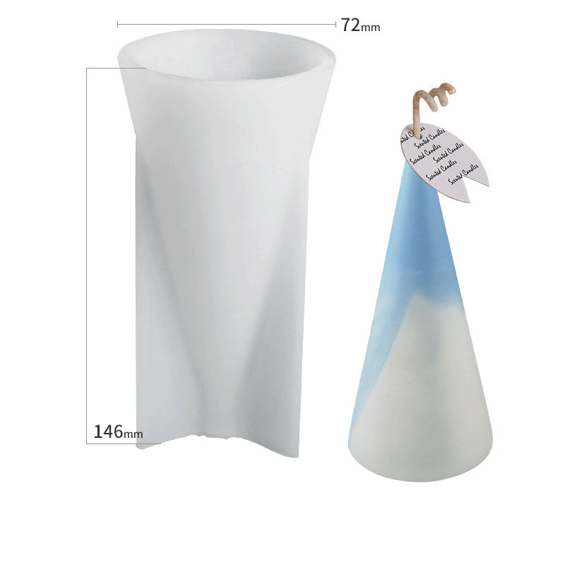 Close-up of cone shape silicone candle mould and completed candle design