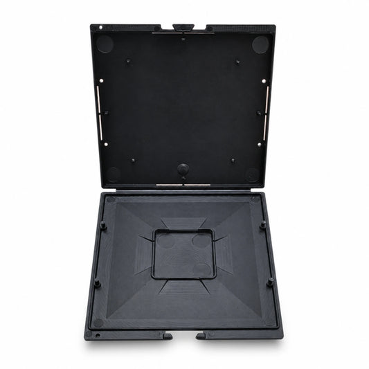Black rectangular plastic case with a lid on a white background
