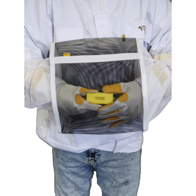 A beekeeper's hands wearing a cozy Queen Bee Muff with adjustable straps, designed to provide warmth and comfort during hive inspections.