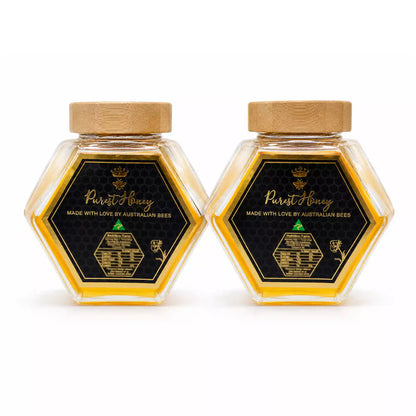Hexagon honey jar with black label and gold lid