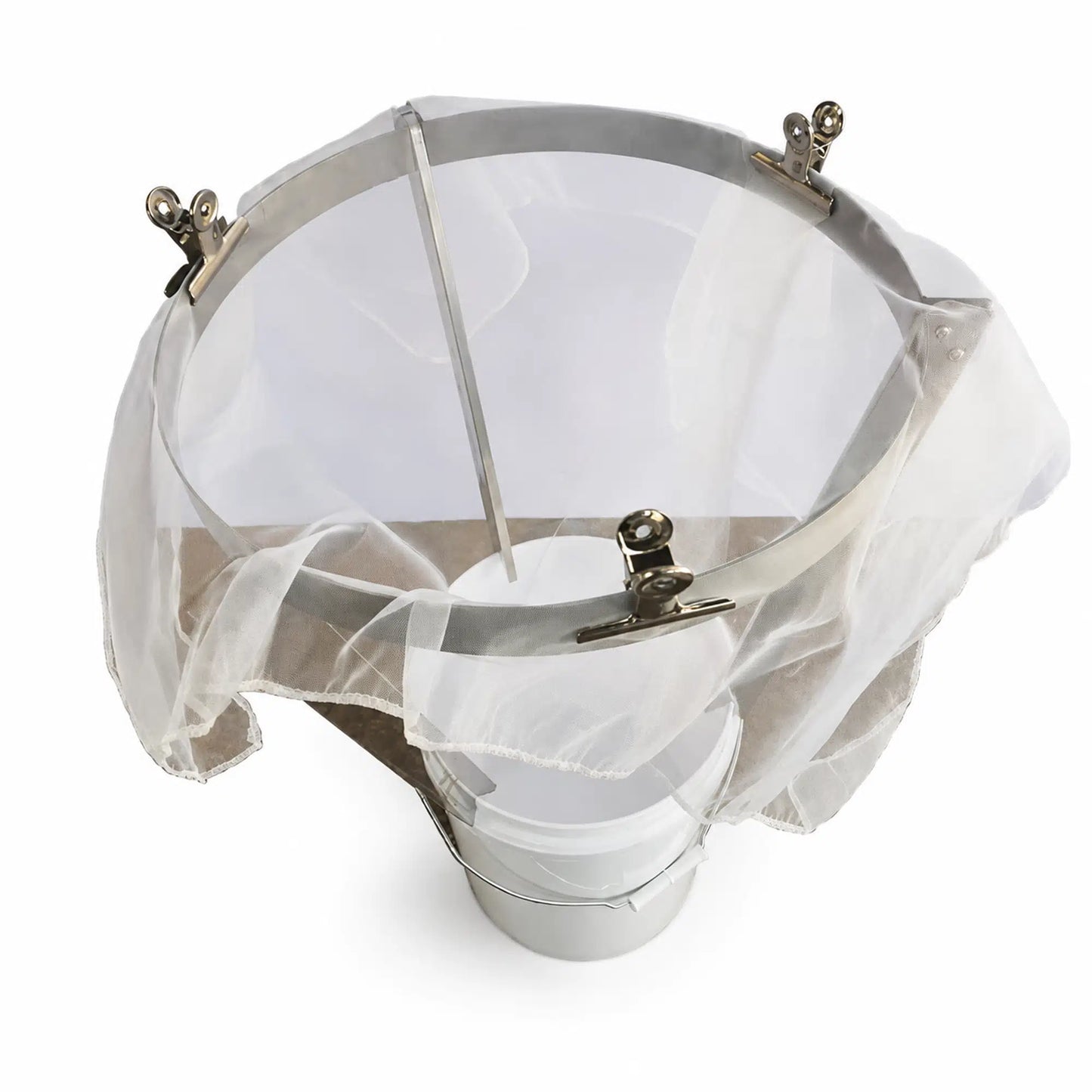 Stainless steel honey strainer mounted on stand above white bucket