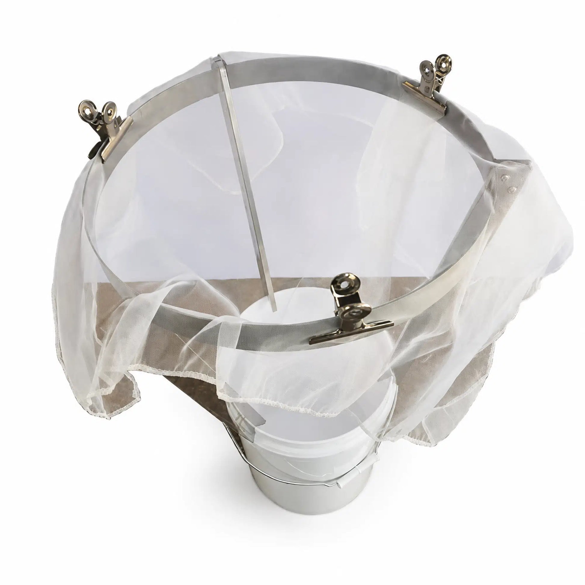 Stainless steel honey strainer mounted on stand above white bucket