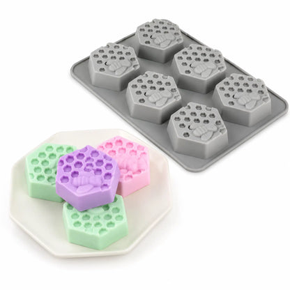 Hexagon honeycomb candle mould tray with completed decorative candles