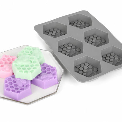 Silicone honeycomb candle mould set with sample candles and angled product view