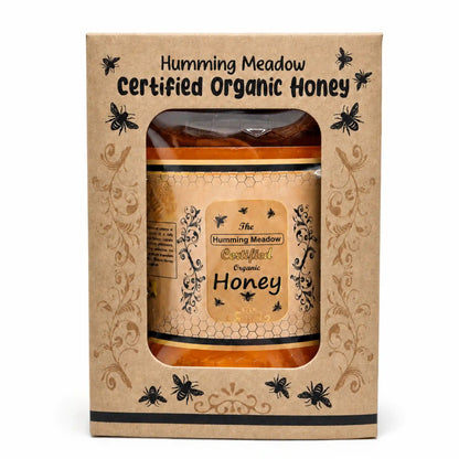 Humming Meadow Certified Organic Honey in eco-friendly kraft gift box packaging with bee illustrations