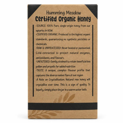 Back of Humming Meadow organic honey box listing source, raw, unfiltered and crystallisation details