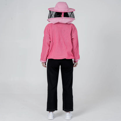 Woman wearing OZ Armour pink 3 layer mesh beekeeping jacket with round hat veil hood up, back view