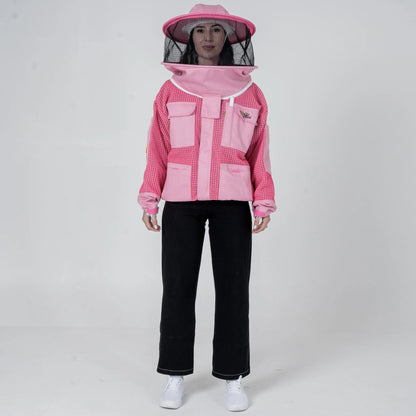 Woman wearing OZ Armour pink 3 layer mesh beekeeping jacket with round hat veil hood up, front view

