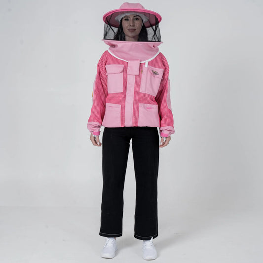 Woman wearing OZ Armour pink 3 layer mesh beekeeping jacket with round hat veil hood up, front view
