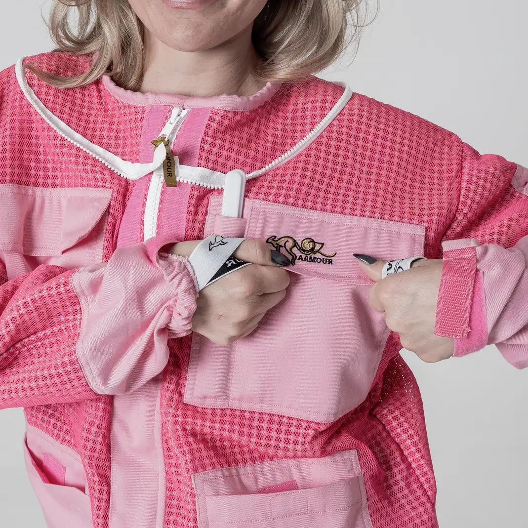  Close up of the front hand pockets on the OZ Armour pink 3 layer beekeeping jacket
