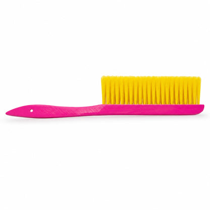 Pink OZ Armour beekeeping bee brush with two rows of yellow bristles, side view