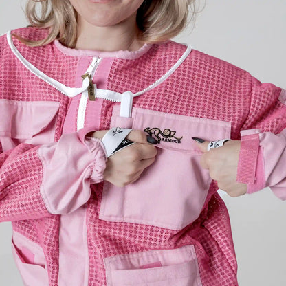 Close up of sleeve cuff and chest pocket on the OZ ARMOUR pink beekeeping jacket
