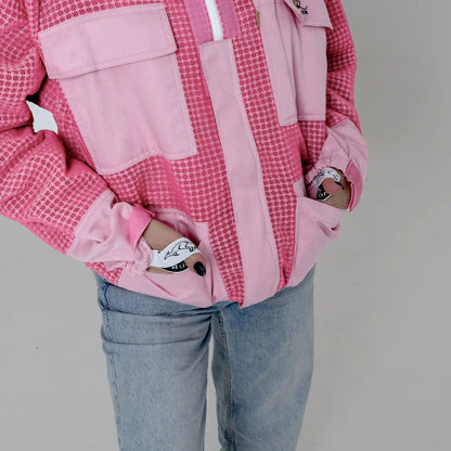 Close up of sleeve cuff and chest pocket on the OZ ARMOUR pink beekeeping jacket