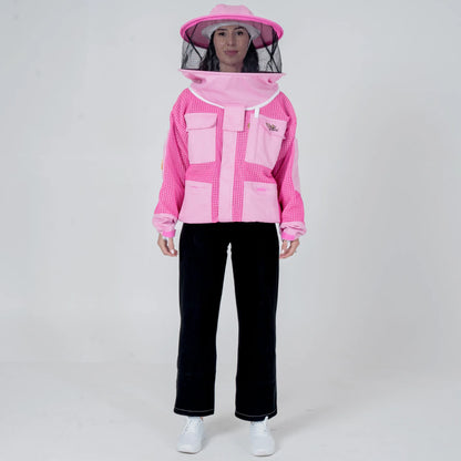 Woman wearing OZ ARMOUR pink beekeeping jacket with round veil hat, front view full body
