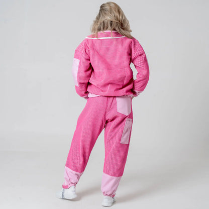 Back view of woman wearing OZ ARMOUR pink beekeeping jacket and trousers set 
