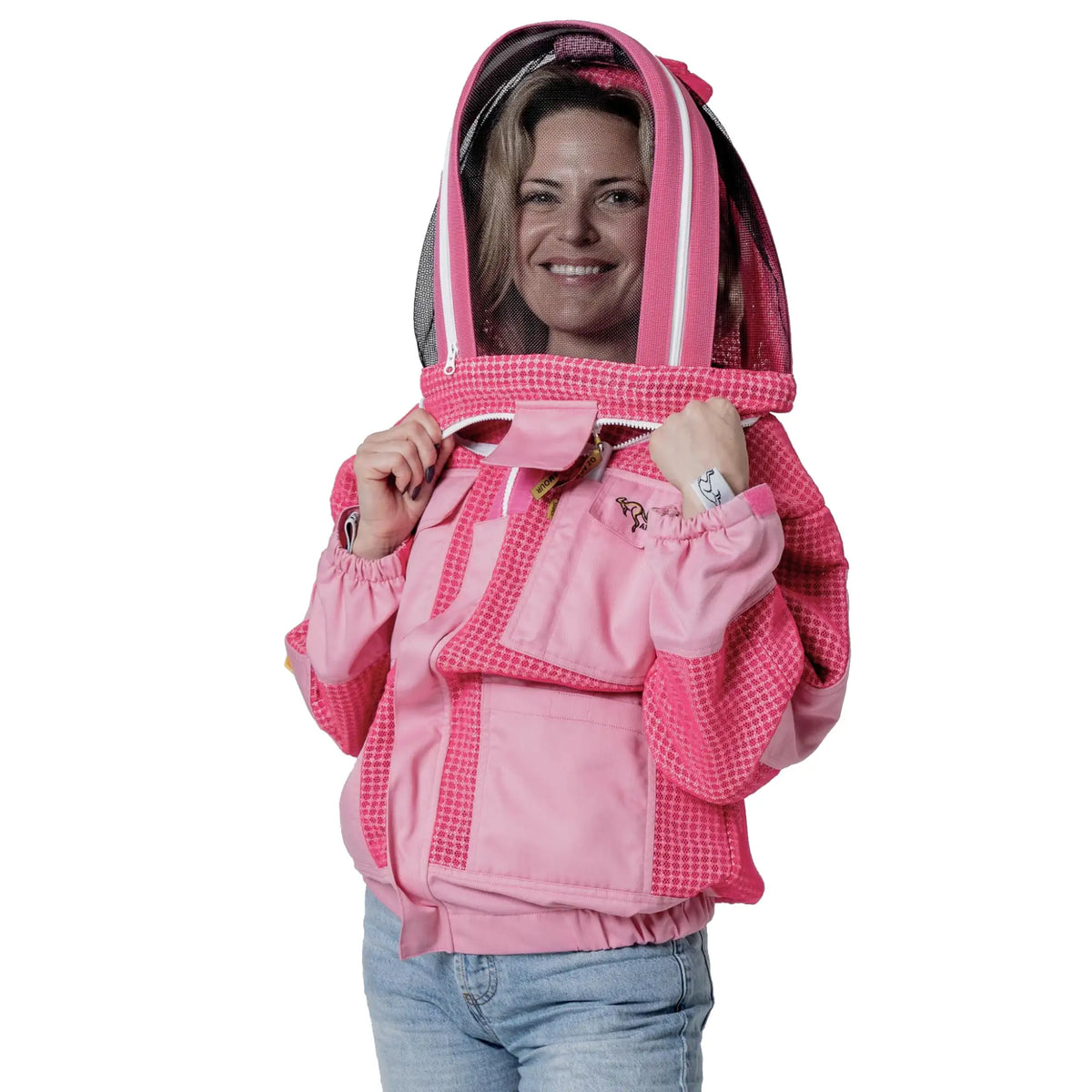 Woman wearing OZ ARMOUR pink beekeeping jacket with fencing veil hood up, front view