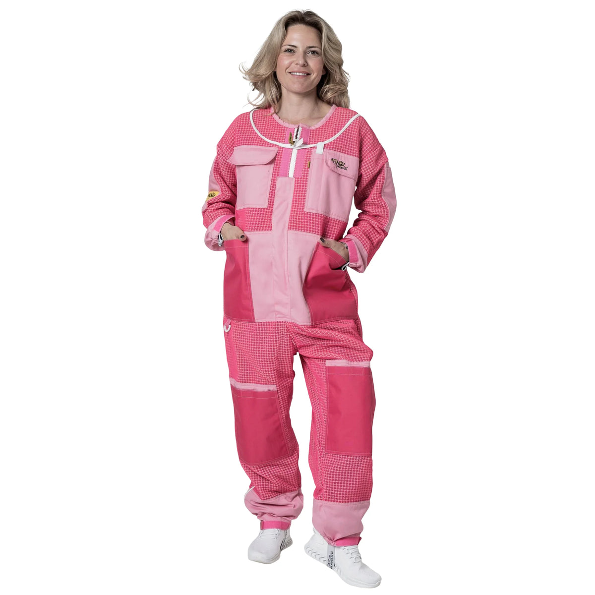 Woman wearing 3 Layer OZ Armour pink suit with hood down, front view