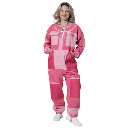 Woman wearing 3 Layer OZ Armour pink suit with hood down, front view