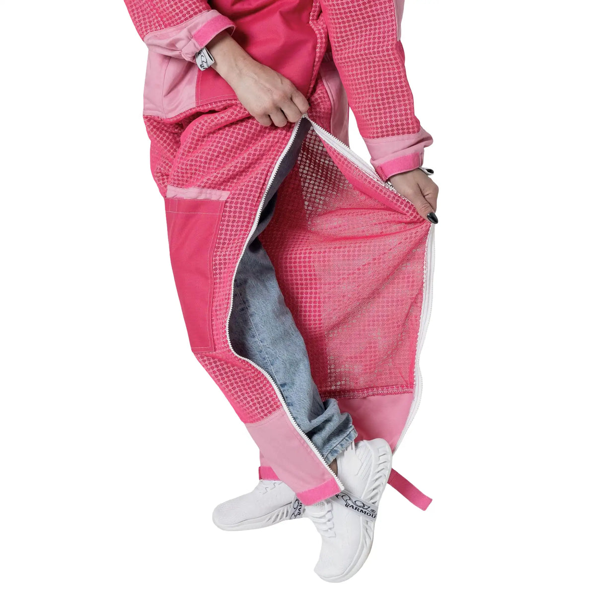 Close up of leg vent zipper open on the 3 Layer OZ Armour pink suit