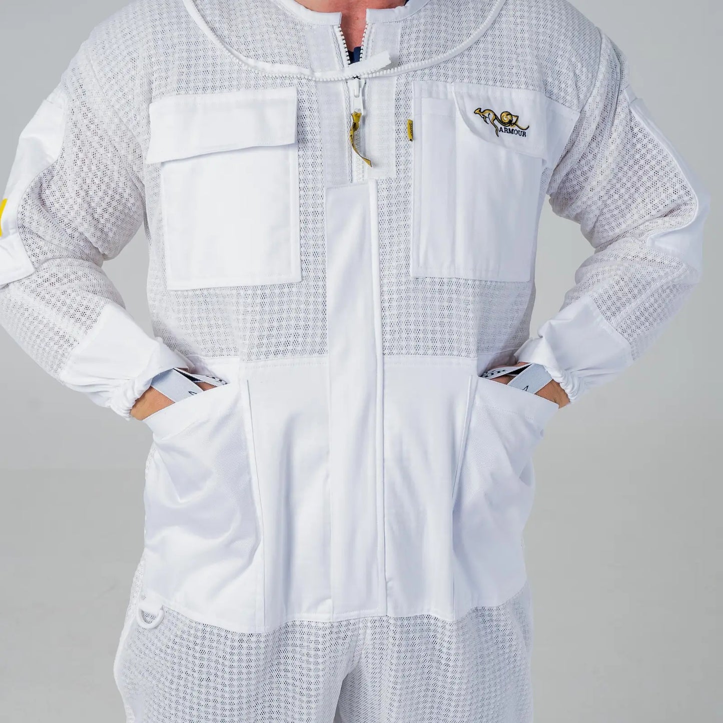Close up of the chest pockets and full length front zip on the OZ Armour white 3 layer beekeeping suit