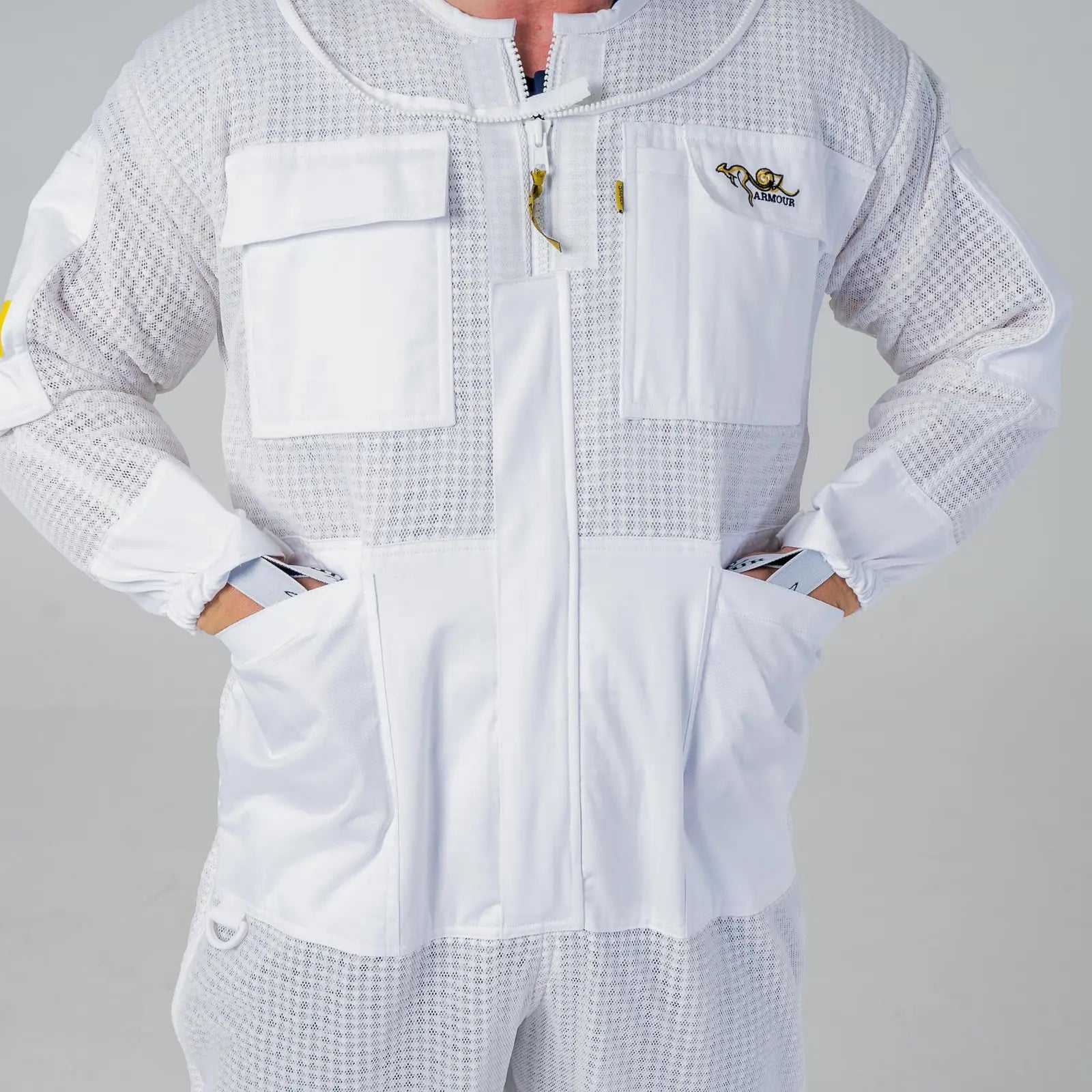 Close up of the chest pockets and full length front zip on the OZ Armour white 3 layer beekeeping suit