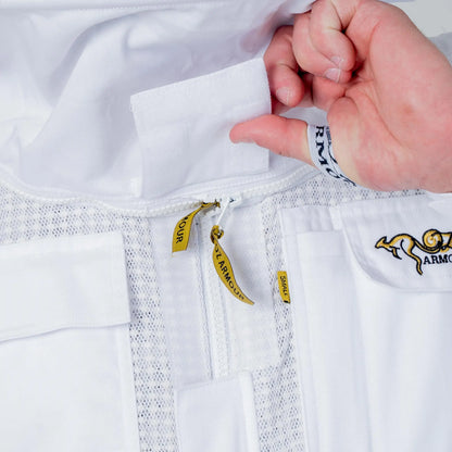 Close up of the collar zip and OZ Armour brand labels on the white 3 layer beekeeping suit