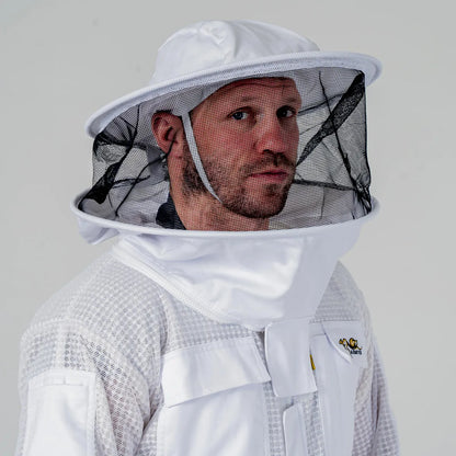 Man wearing OZ Armour white 3 layer beekeeping suit with round hat veil, close up front view