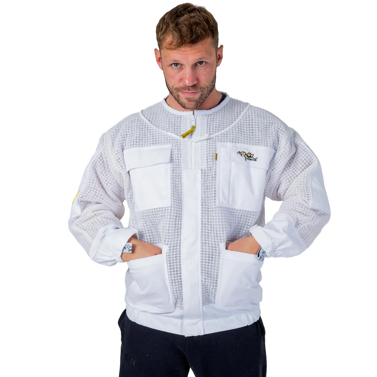 Man wearing the OZ ARMOUR 3 Layer Mesh Beekeeping Jacket with Round Veil, front view, hood down