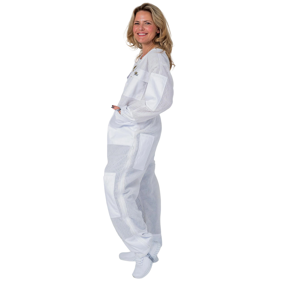 Woman wearing the OZ ARMOUR 3 Layer Mesh Beekeeping Suit with Fencing Veil, full body side view, hood down
