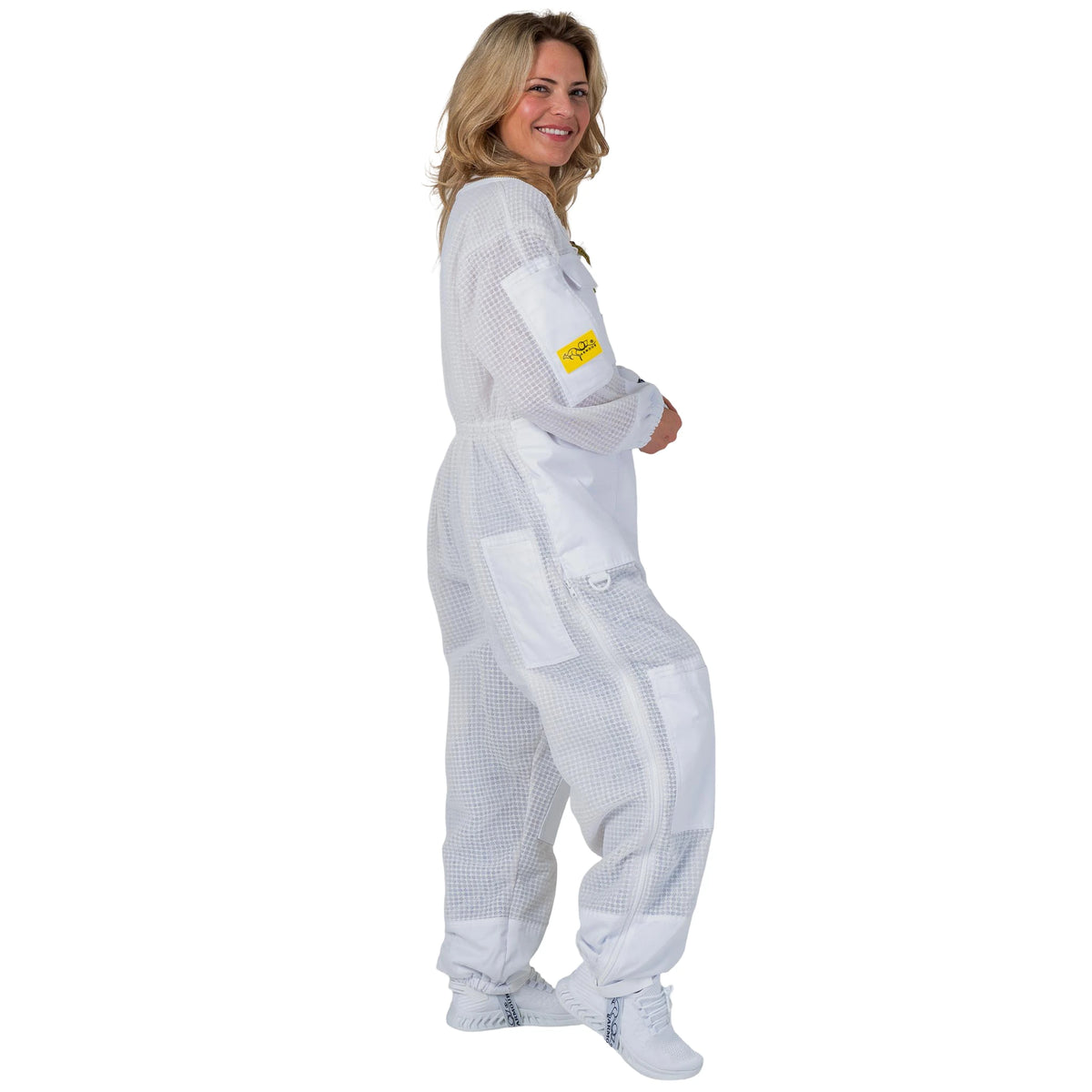 Woman wearing the OZ ARMOUR 3 Layer Mesh Beekeeping Suit with Fencing Veil, full body walking side view, hood down