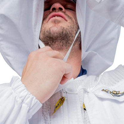 Close up of close up adjusting the chin strap under the veil
