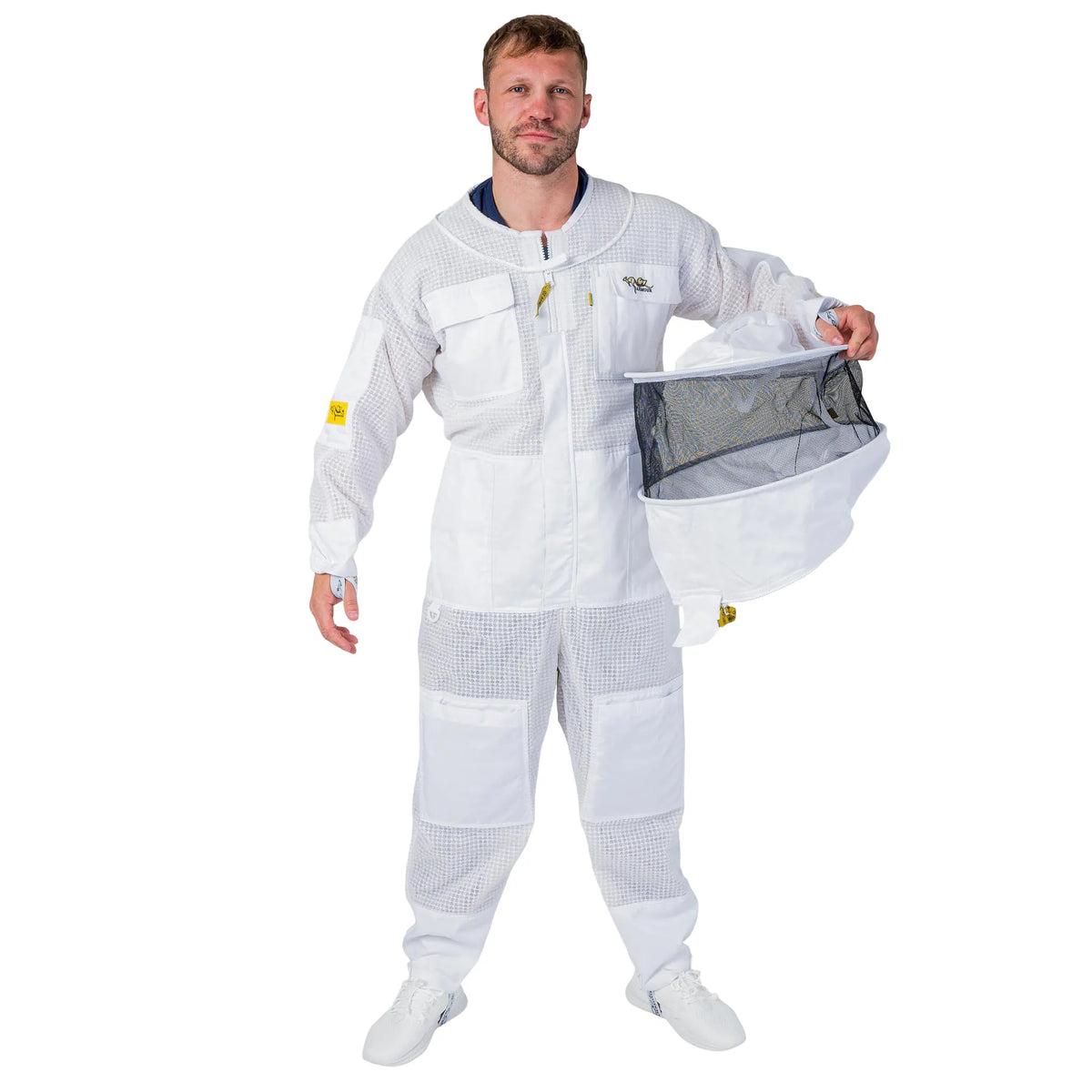 Man wearing the OZ ARMOUR 3 Layer Mesh Beekeeping Suit with Round Veil, front view, holding the detached round veil
