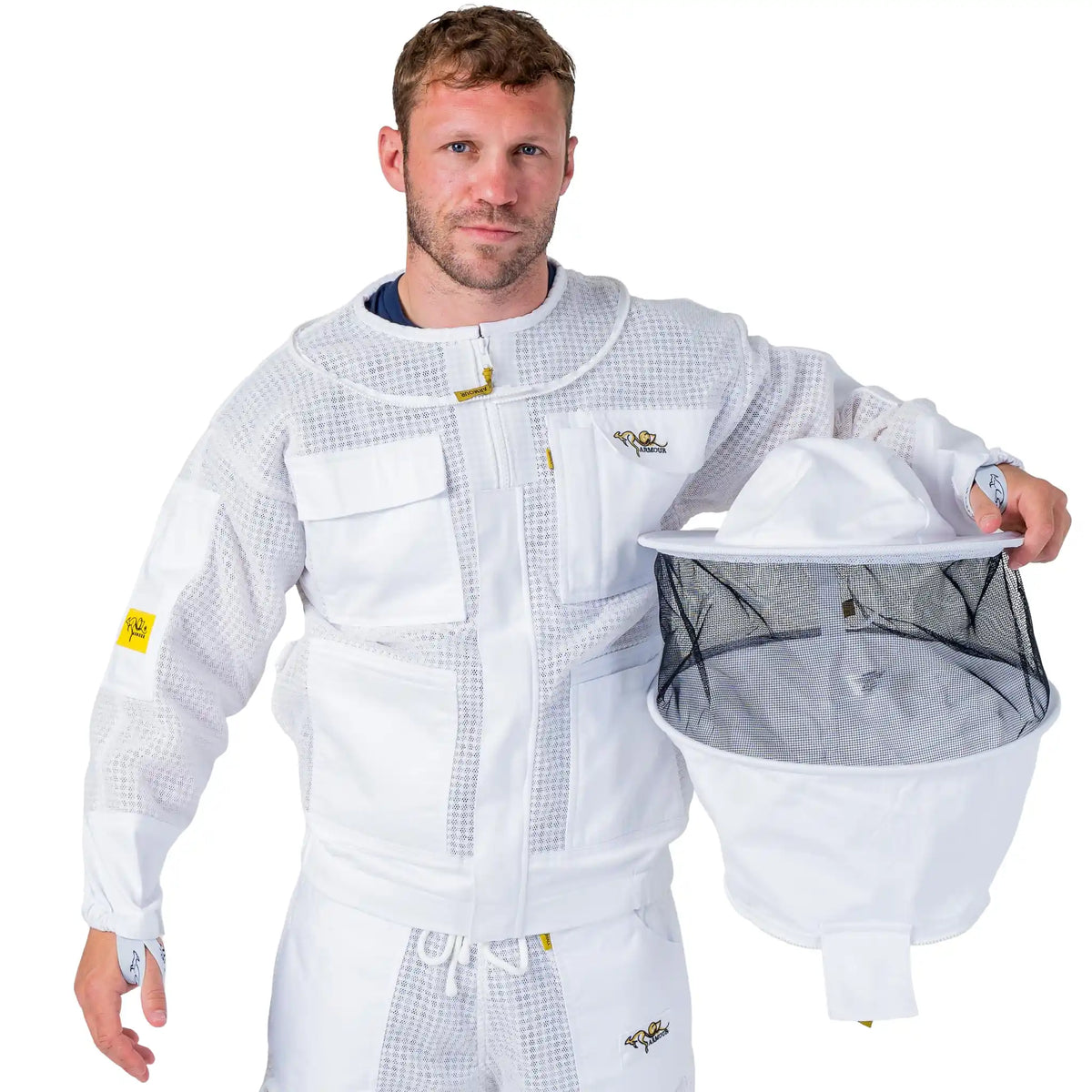 Man wearing the OZ ARMOUR Beekeeping Jacket and Trouser Set with Round Veil, front view, holding the detached round veil