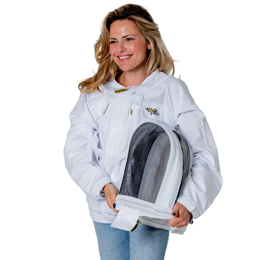 Woman wearing the OZ ARMOUR Poly Cotton Beekeeping Jacket with Fencing Veil, front view, holding the detached fencing veil
