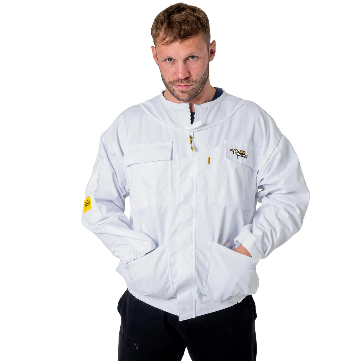 Man wearing the OZ ARMOUR Poly Cotton Beekeeping Jacket with Round Veil, full body front view, hood down