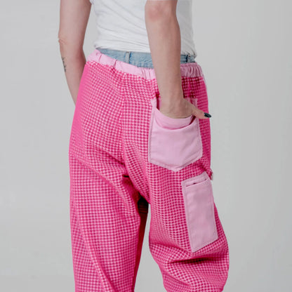 Close up of back pockets on the pink beekeeping trousers