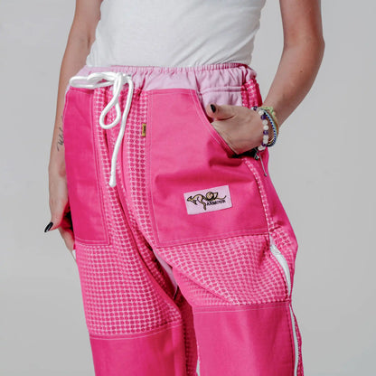  Close up of waist drawstring and front pocket on the pink beekeeping trousers