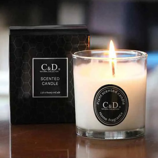 Soy wax candle in a glass jar with black box packaging