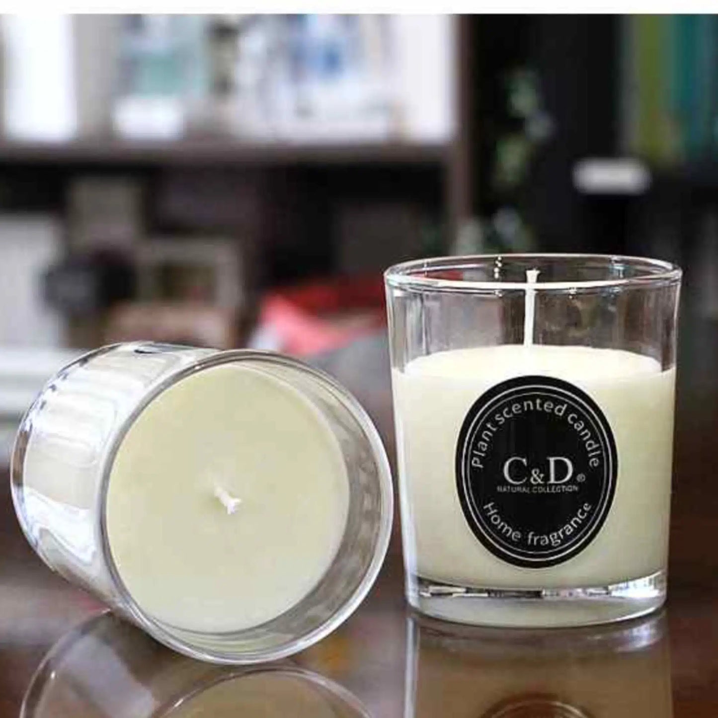 Candle jar and packaging box displayed on table