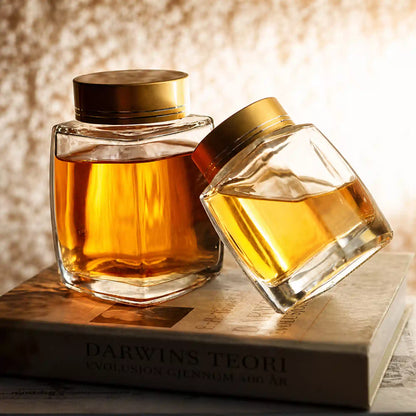 Premium square glass honey jars with gold lids for gifting