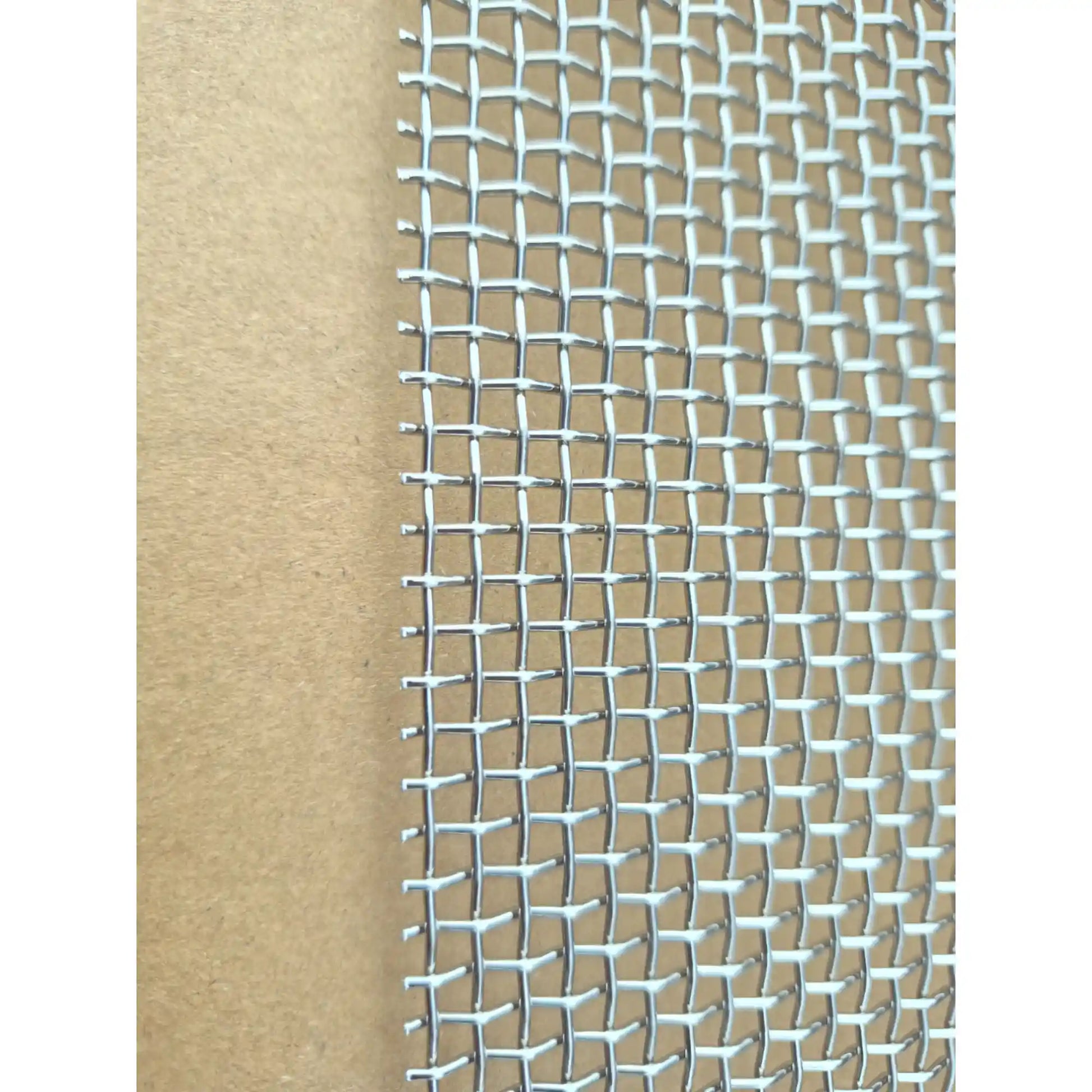 Close-up of stainless steel mesh weave for hive ventilation and beetle control