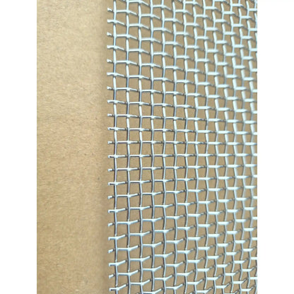 Close-up of stainless steel mesh weave for hive ventilation and beetle control