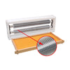 Uncapper Tool Uncapping a Frame in Few Seconds - Efficient beekeeping equipment for quick uncapping processes.