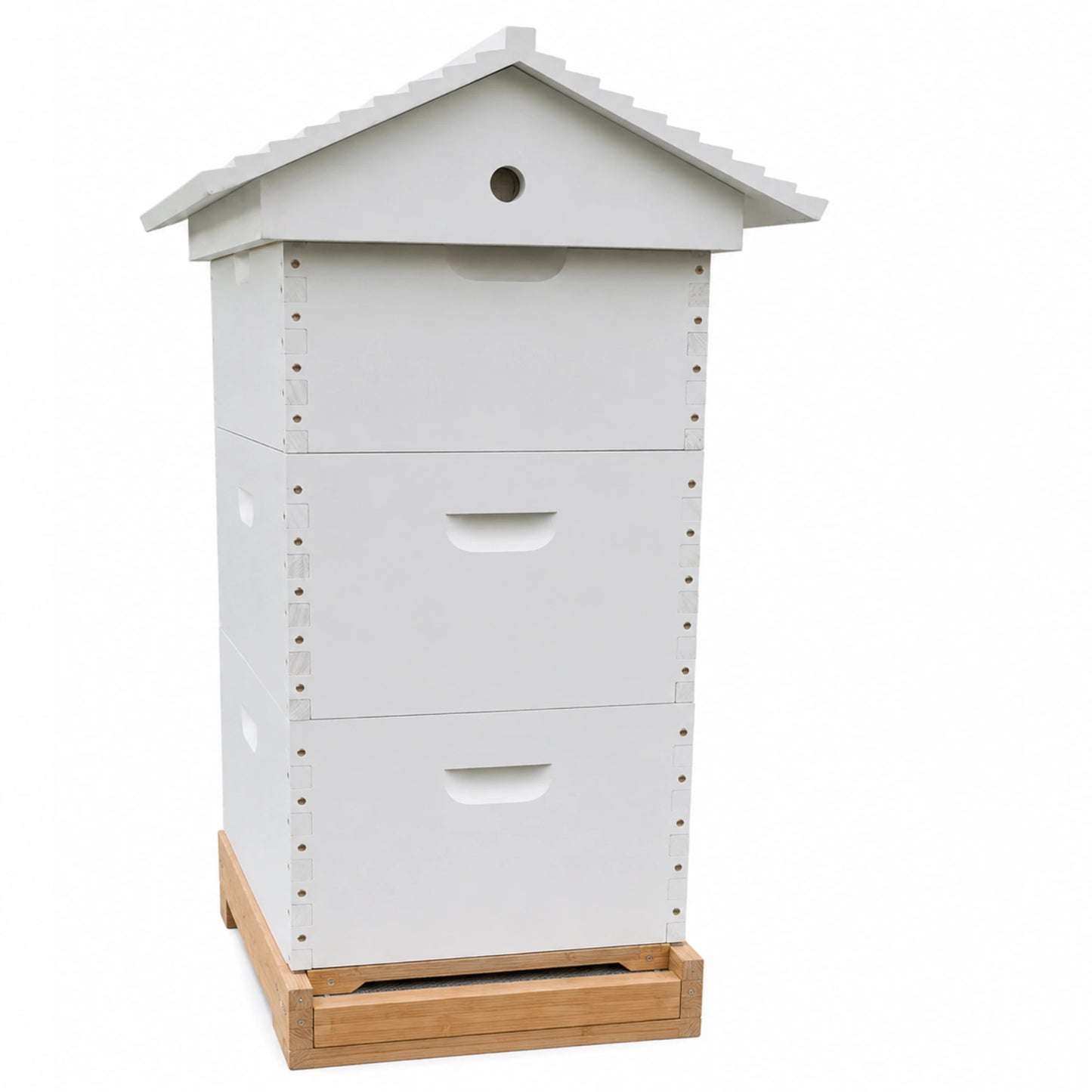 White three-box Langstroth beehive with a peaked gabled roof and ventilated entrance, shown from the front with the pull-out bottom tray extended on a wooden stand